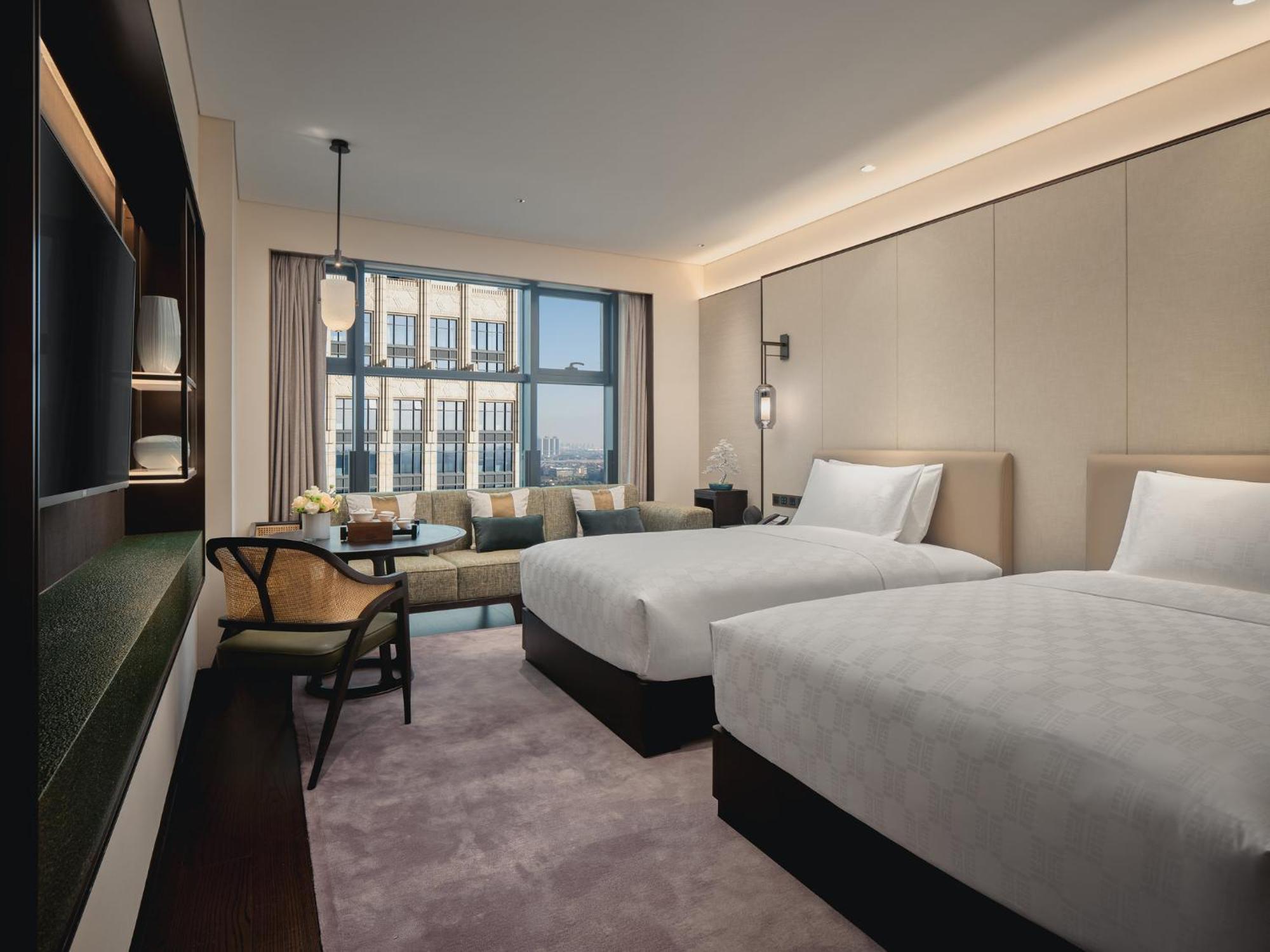 Hualuxe Kunshan Huaqiao By Ihg - F1 Racing Preferred Hotel Exterior photo