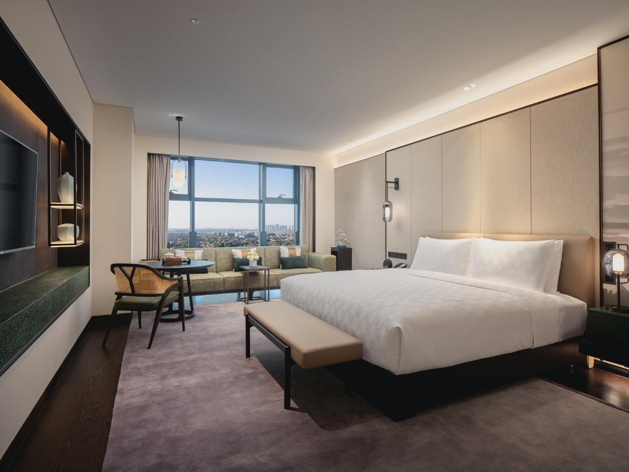 Hualuxe Kunshan Huaqiao By Ihg - F1 Racing Preferred Hotel Exterior photo
